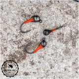 Three 3 Butano Perdigon Fly fishing jigs with orange and black  'Piscator Flies'.