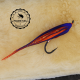 A wet Red Popsicle Alaskabou Steelhead and Salmon fly fishing Flies